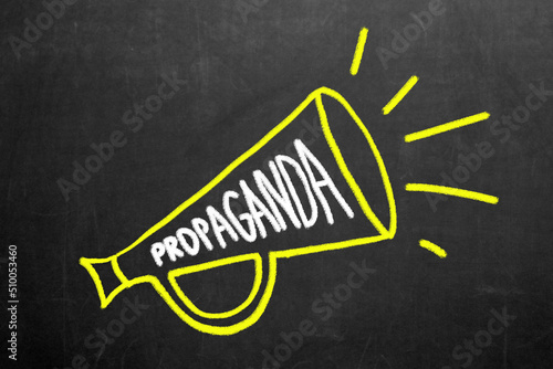 Propaganda and fake news concept. A megaphone with the word propaganda. Misinformation and counterinformation concept. photo