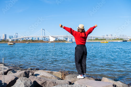 Tourist with landscape view at odaiba beach famous landmark at Japan.