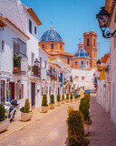Street in Altea (Spain) with church in the background