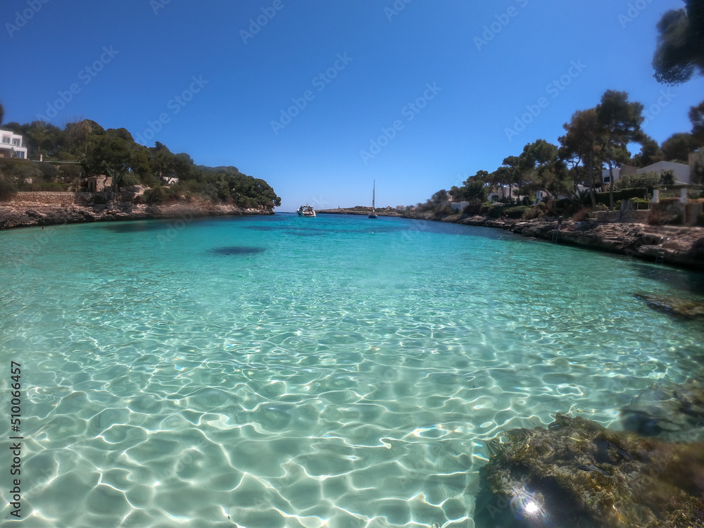  Beautiful view of the seacoast of Majorca with an amazing turquoise sea, in the middle of the nature. Concept of summer, travel, relax and enjoy