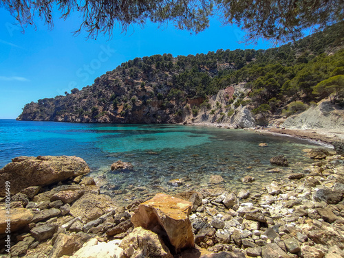  Beautiful view of the seacoast of Majorca with an amazing turquoise sea, in the middle of the nature. Concept of summer, travel, relax and enjoy
