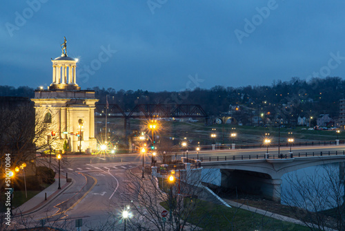 The Hamilton, Ohio Butler County Monument and the Great Miami River bridge at night. photo