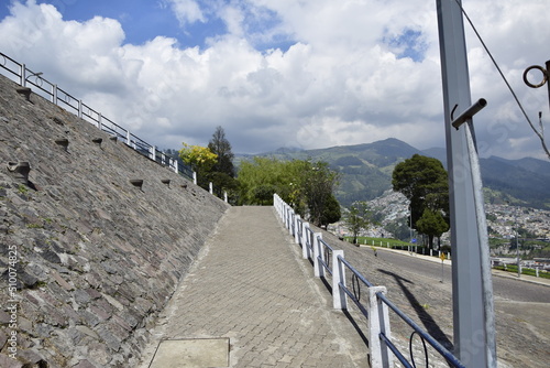 the road along the city park in Quito. Historic center of Quito is the first UNESCO WOrld Heritage site