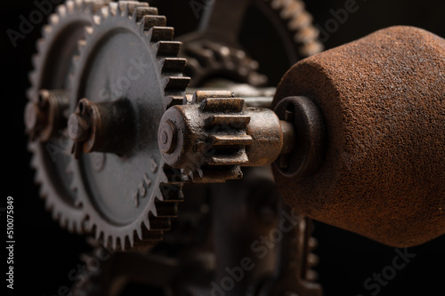 Close up of sharpening wheel gears on old fashioned grinding tool