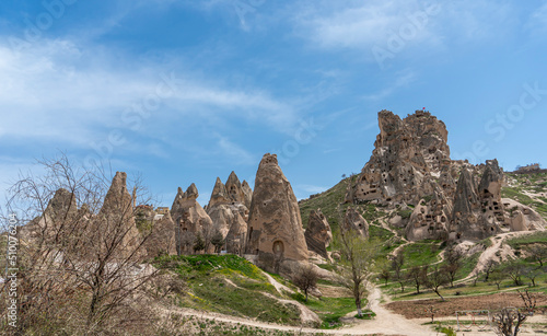 Uchisar castle, walking road and pigeon valley in Cappadocia, Nevsehir, Turkey. Travel destination.