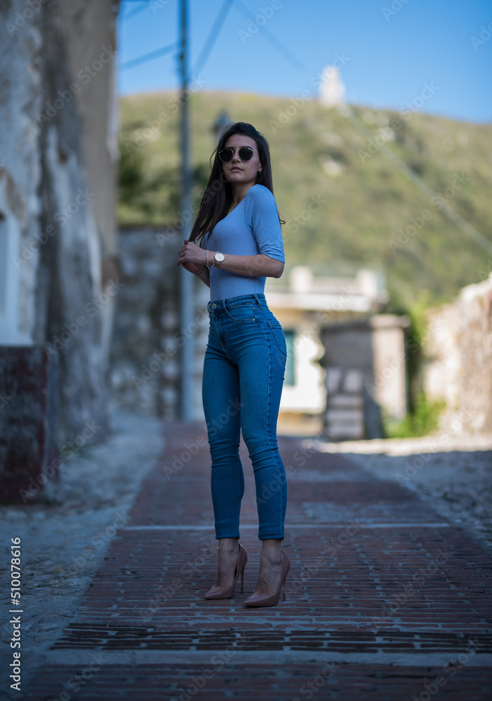 girl in jeans and décolleté girl in jeans and décolleté