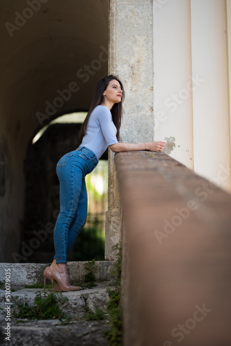 girl in jeans and décolleté photo