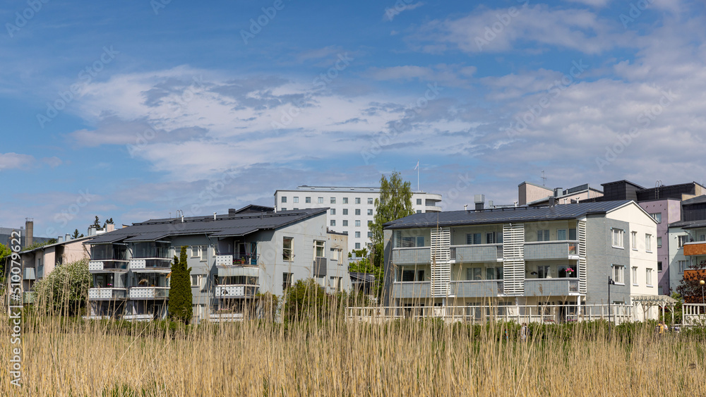 Green environmental residential district in Helsinki on a bright summer day Green environmental residential district in Helsinki on a bright summer day