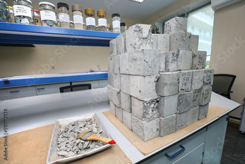 Modern laboratory for testing road samples and materials concept. Cement concrete samples for testing.