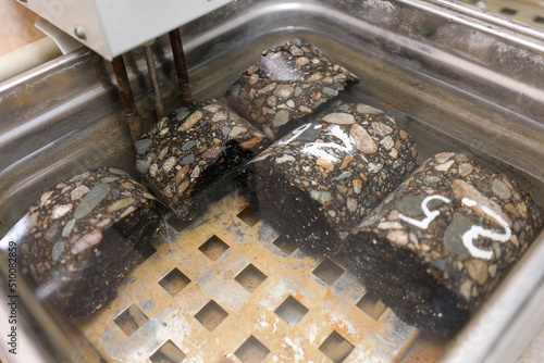 Modern laboratory for testing road samples and materials concept. Samples of the top layer of the road surface. Cores.