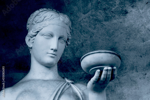 Statue of Hebe 'Goddess of Youth' Reproduction version, Face detail perspective, Hand Holding Bowl, Eyes looking into Copy Space