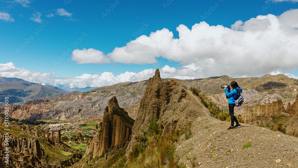 A tourist photographs the Canyon de Palca near La Paz, Bolivia.