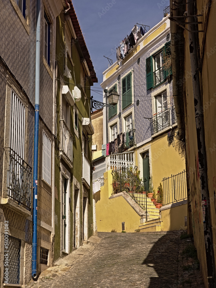 Small alley in Alfama desitrict, lisbon, portugal