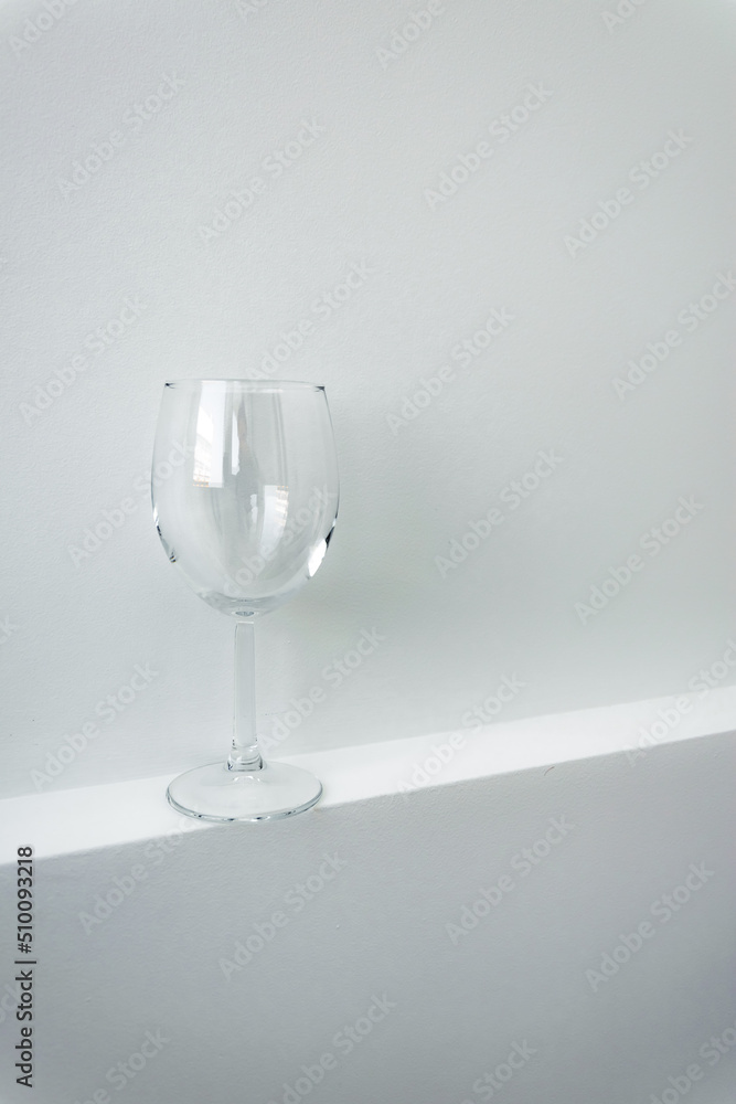 empty champagne wine glass on isolated white background. mockup for drinks and juices. crockery, transparent glass for juice cocktails