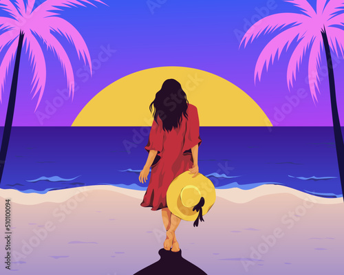 Woman on a tropical paradise beach watching the sunset