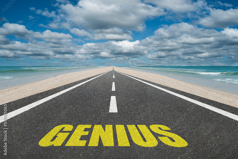 The word Genius written on a road at the beach for brilliance and knowledge concept.