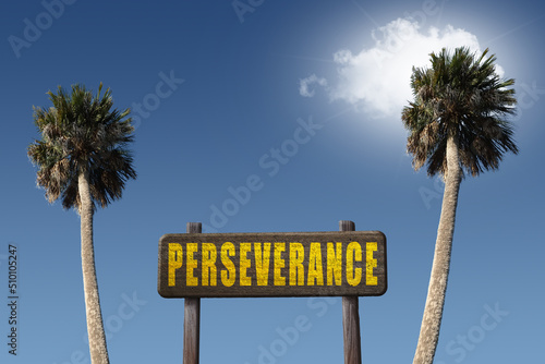 Motivational Perseverance sign with sunny sky and palm trees.