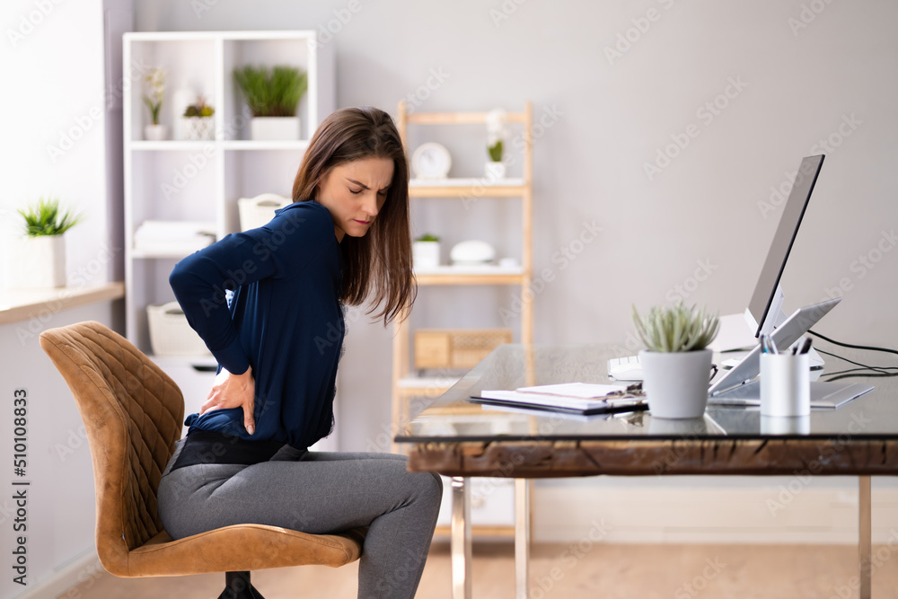 Businesswoman Having Back Pain Businesswoman Having Back Pain