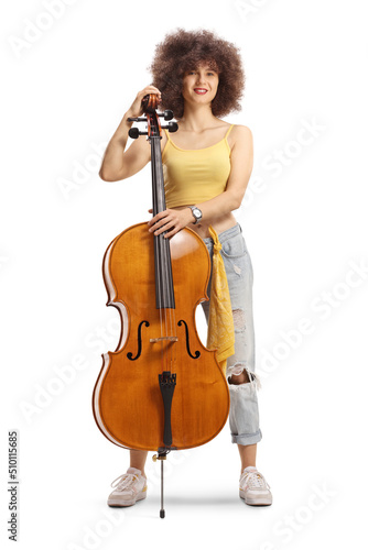Young female musician standing with a contrabass and smiling