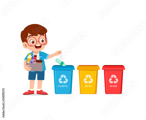 little kid throw plastic waste to recycle bin