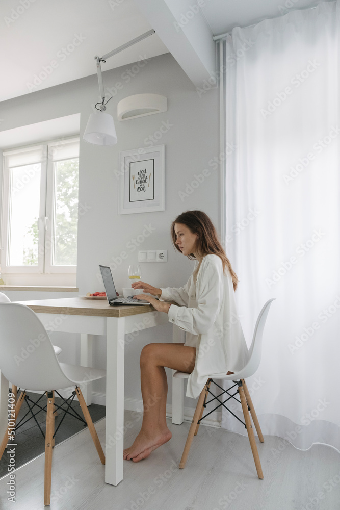 A girl in a bright apartment A girl in a bright apartment