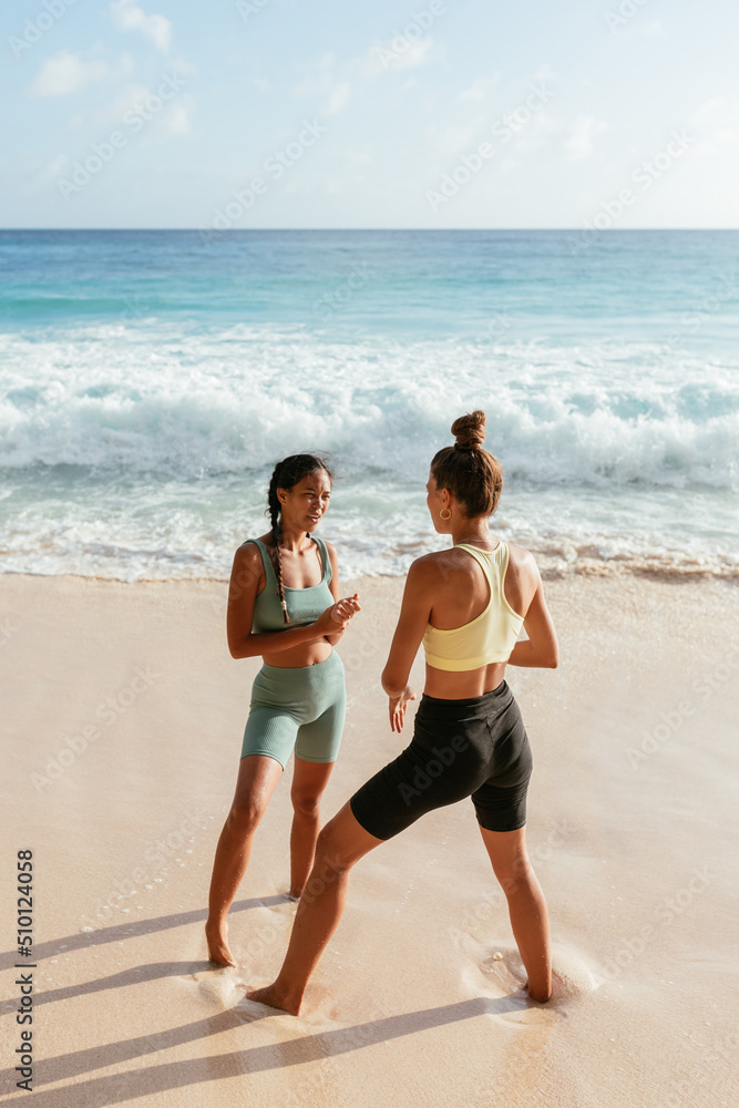 Women Talking On The Beach Women Talking On The Beach