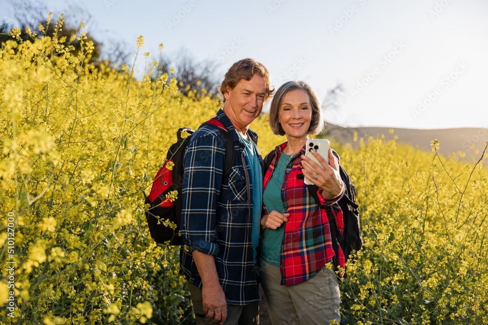 Hiking Couple Takes a Selfie Together Hiking Couple Takes a Selfie Together