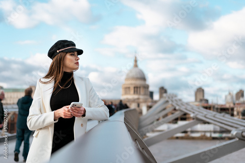 An elegant female tourist in the city photo