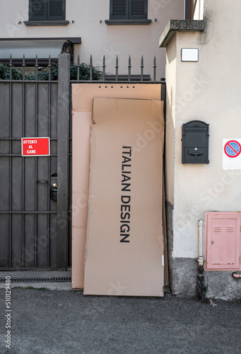 Italian design cardboard box outside house photo