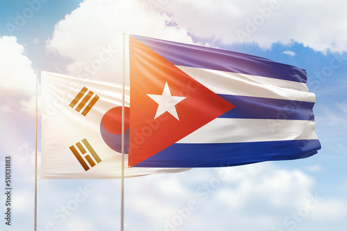 Photography Sunny blue sky and flags of cuba and south korea