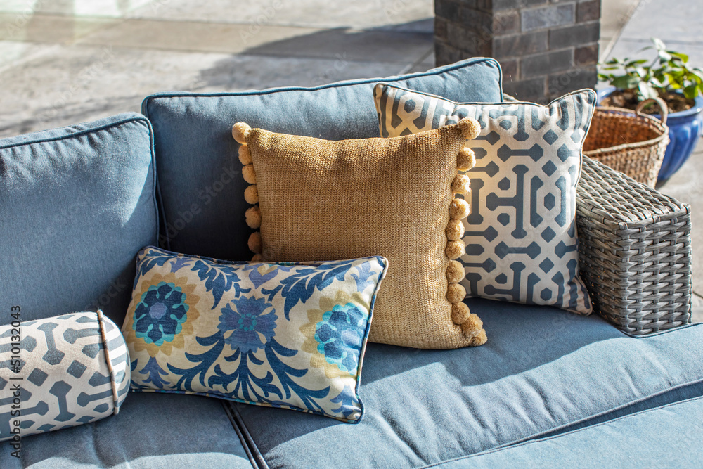 © Leah Flores/Stocksy - Cozy Pillows on Outdoor Couch © Leah Flores/Stocksy - Cozy Pillows on Outdoor Couch