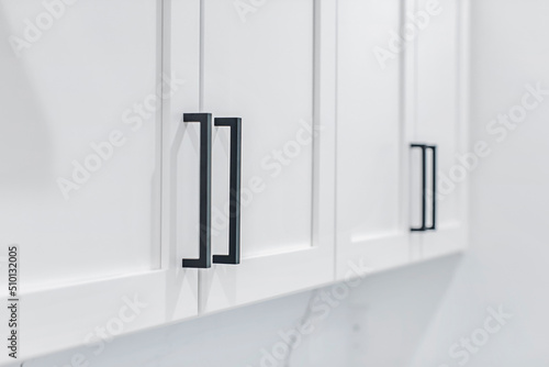 Closeup of Cabinet Doors in a White Kitchen