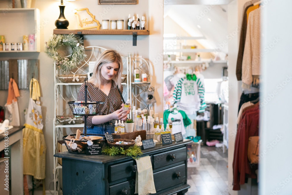 Boutique: WOman Browsing Essential Oils In Store Boutique: WOman Browsing Essential Oils In Store