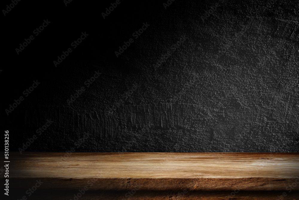 Wooden table in dark room background concept for advertising. Wooden table in dark room background concept for advertising.