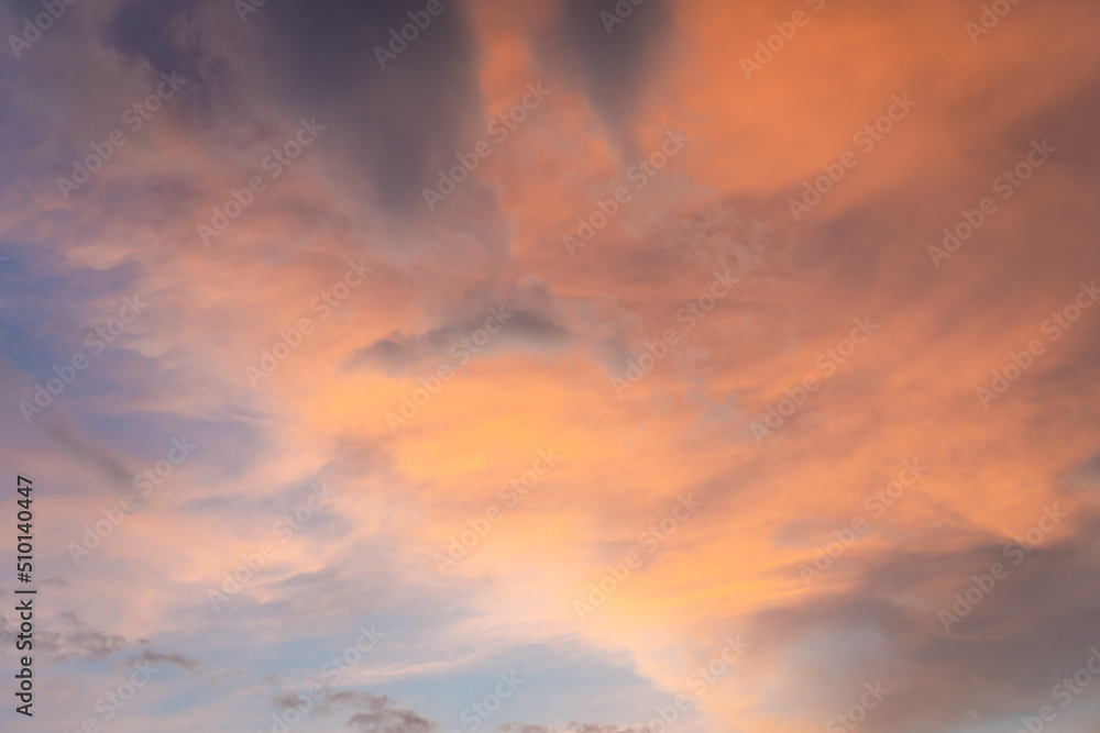 Obraz premium Beautiful sunset and sunrise twilight blue, orange sky, and clouds in the morning above clouds with dramatic light.