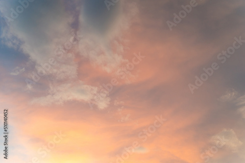 Beautiful sunset and sunrise twilight blue, orange sky, and clouds in the morning above clouds with dramatic light.