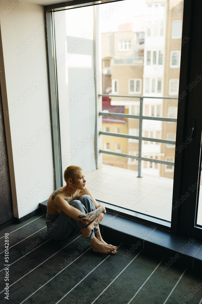 Androgyne person indoors Androgyne person indoors