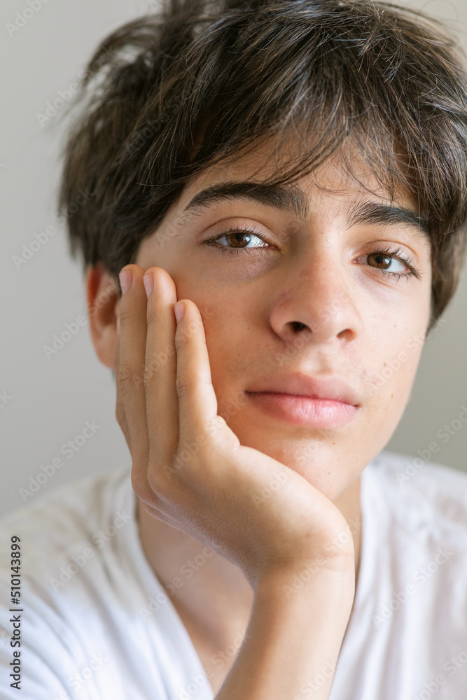 Friendly teenager smiling at camera headshot Friendly teenager smiling at camera headshot