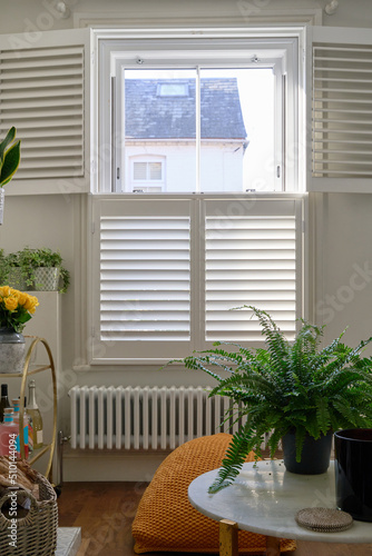 Interior of lounge room with European blinds photo