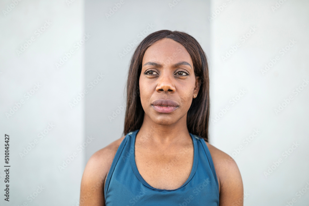 Portrait of black woman in sportswear outdoors Portrait of black woman in sportswear outdoors