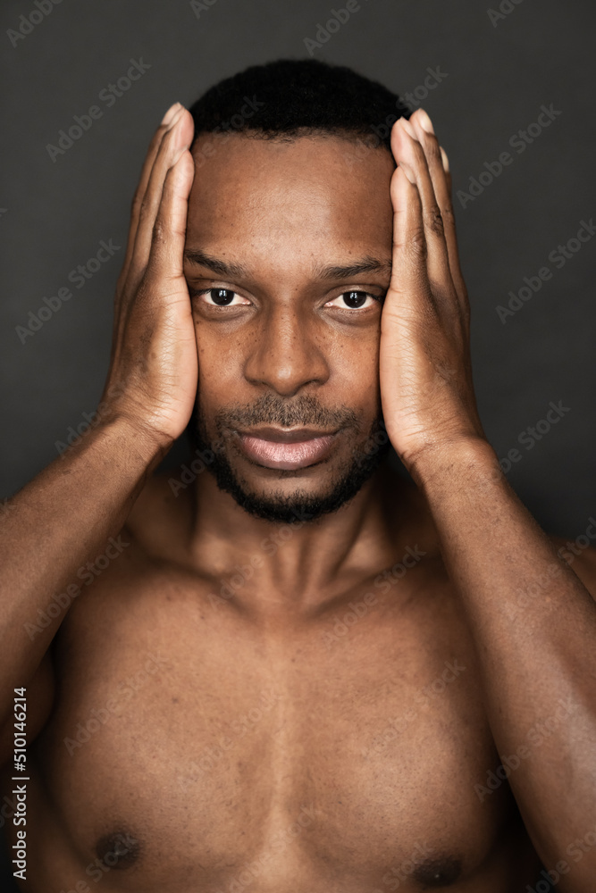 Black Man Holding His Head With Hands Black Man Holding His Head With Hands