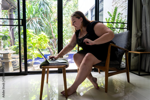 Plus size business woman works from home