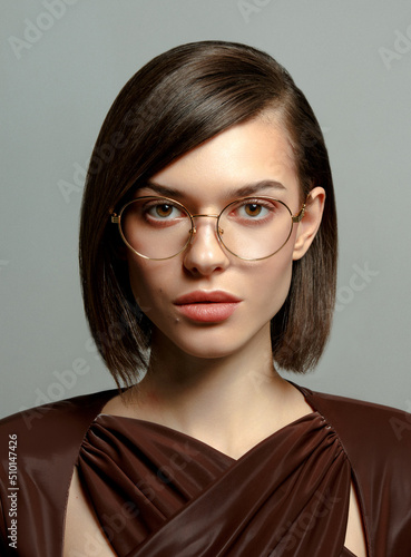 Girl in glasses photo