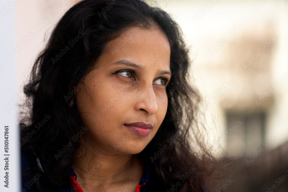 Headshot portrait of an Indian woman at outdoors ,profile shot Headshot portrait of an Indian woman at outdoors ,profile shot