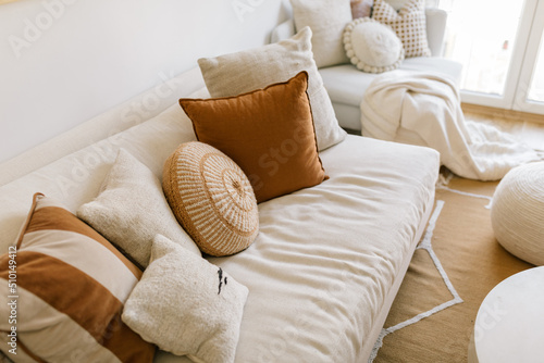 Living room sofa and various cushions photo