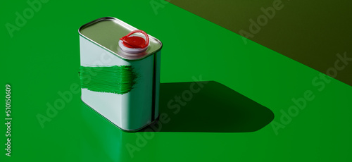 motor oil can painted green, in web banner format photo