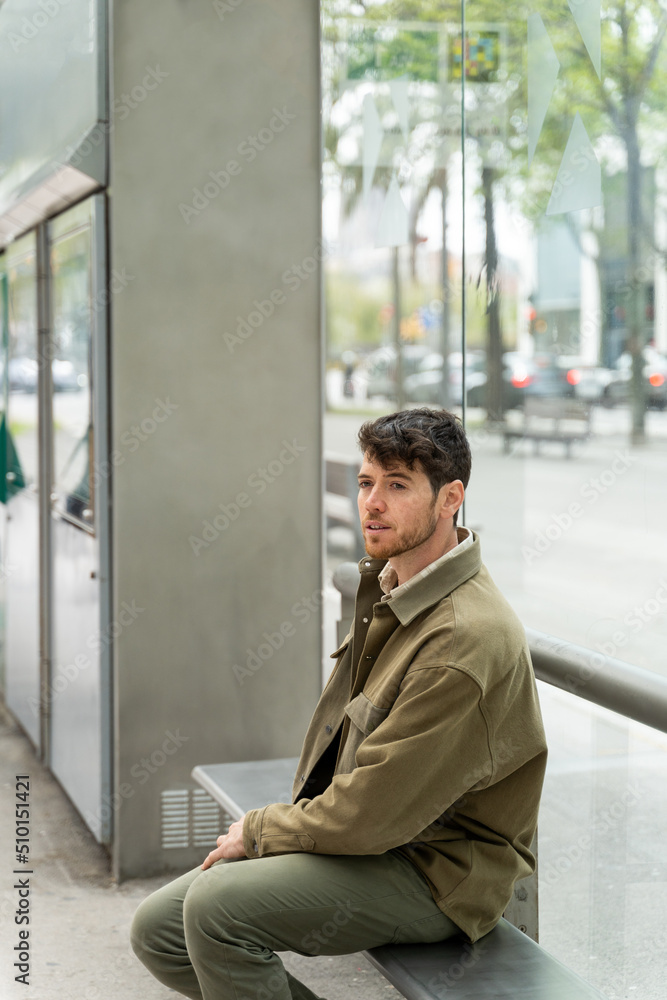Man waiting urban transport at city Man waiting urban transport at city