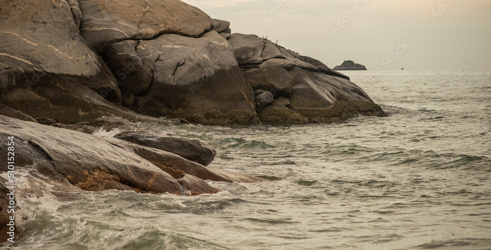 The waves of the sea swept towards the stone. The waves of the sea swept towards the stone.