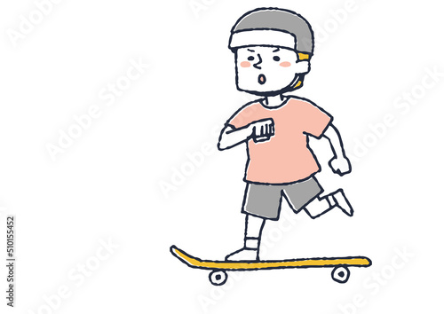 スケートボードをしている男の子　体を動かし元気よく遊ぶ子供たち