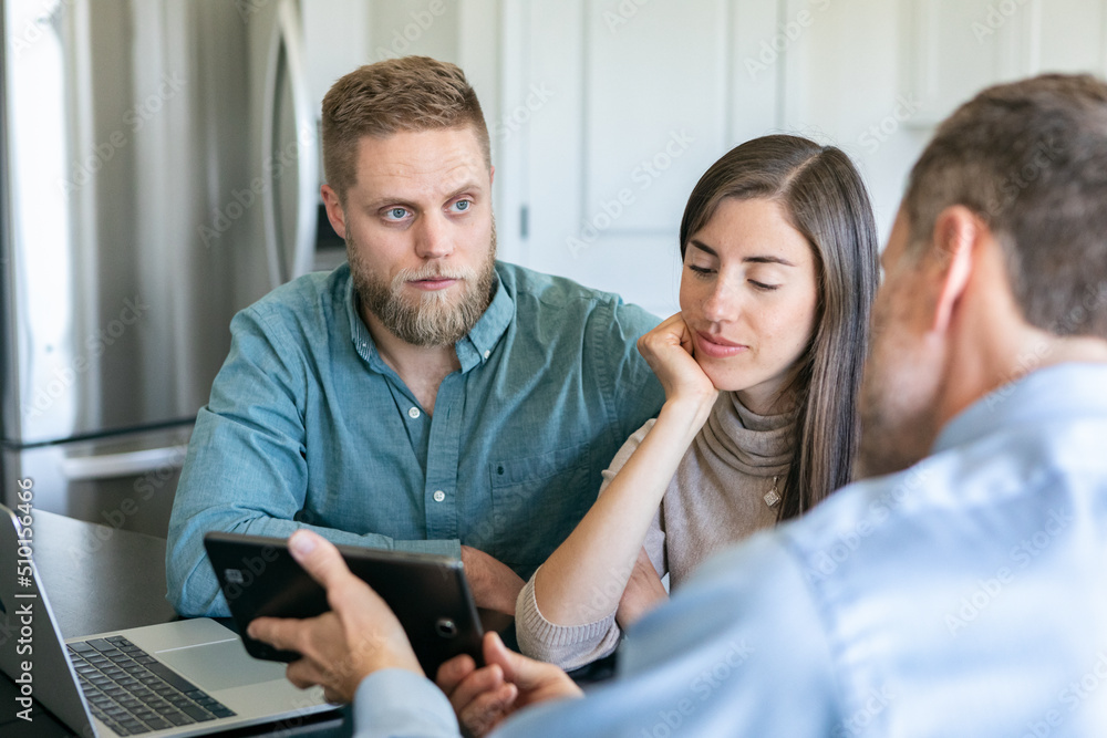 Financial Advisor Uses Tablet To Show Information Financial Advisor Uses Tablet To Show Information